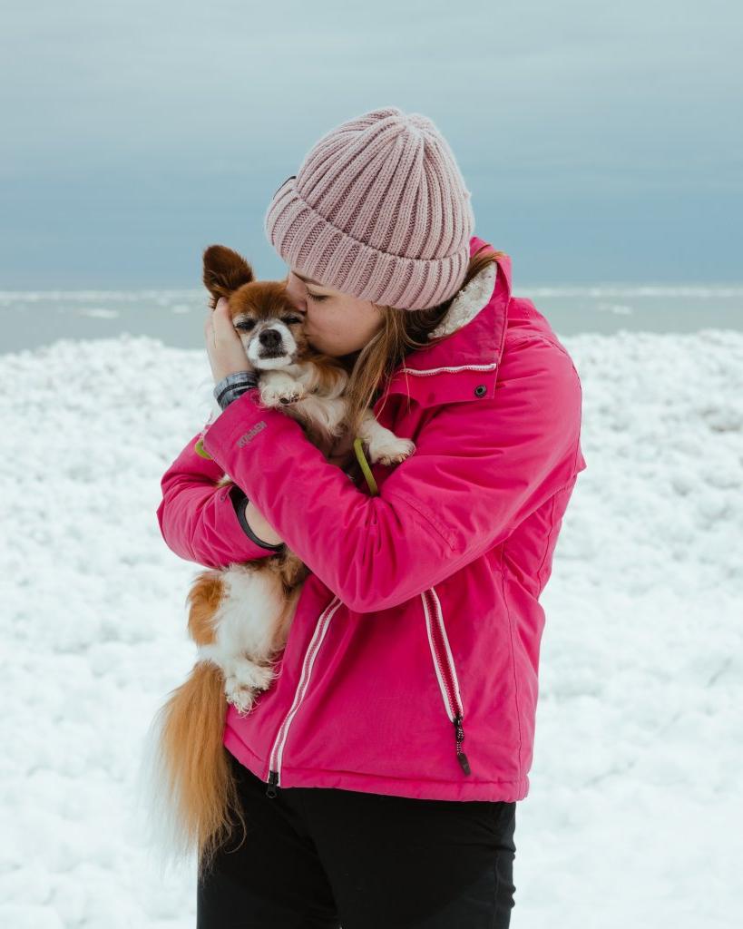 GIRL WITH DOG IN THE WINTER